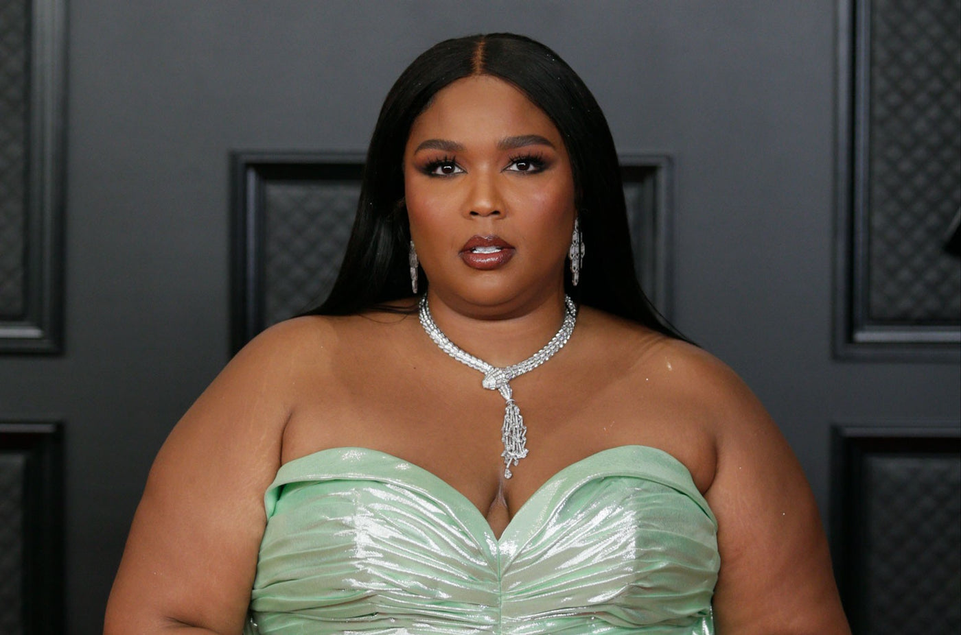 Lizzo tearfully slams 'fatphobic,' 'racist' haters as Cardi B and more celebs offer support